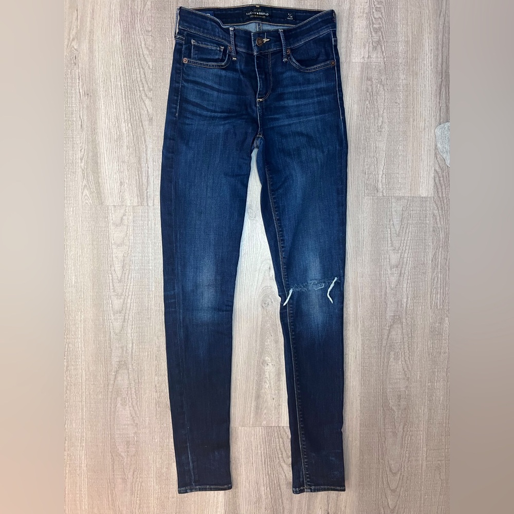 Blue Skinny Jeans with Stretchy Fit and Distressed Details
